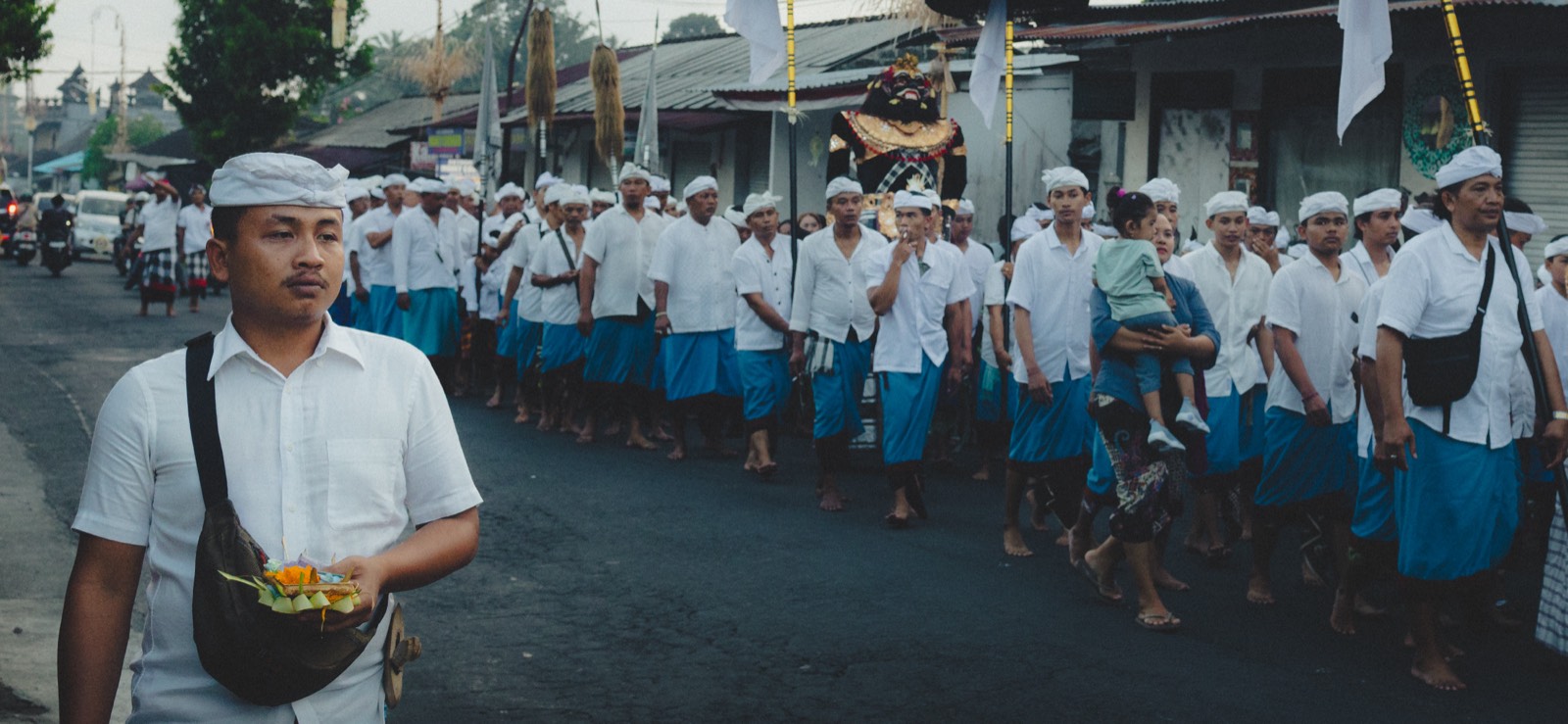 Traditional Balinese ceremony procession in white clothing, Indonesia